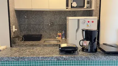 A cozinha ou kitchenette de Iracema Residence Frente Mar by Escala Imóveis