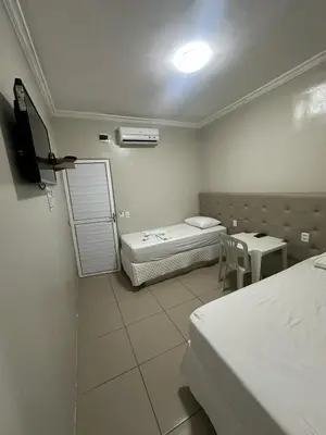 Uma televisão e/ou sistema de entretenimento em PRINCESA HOTEL Russas