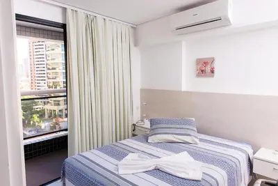Uma cama ou camas num quarto em Landscape Comfort Residences