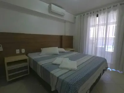 Uma cama ou camas num quarto em Landscape Comfort Residences
