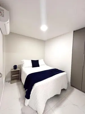 Uma cama ou camas num quarto em Acquarius residence estrutura de nova construção situada na praia de Iracema