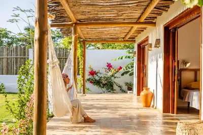 Um jardim no exterior de Villa Dodô Barrinha de baixo Prea Kite point com café da manha