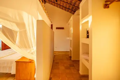 Uma cama ou camas num quarto em Villa Dodô Barrinha de baixo Prea Kite point com café da manha