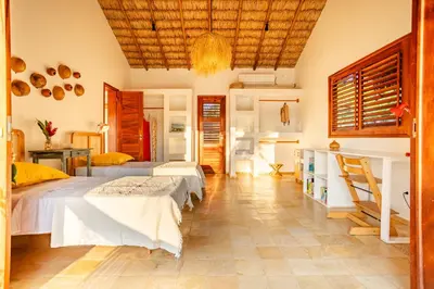 Uma cama ou camas num quarto em Villa Dodô Barrinha de baixo Prea Kite point com café da manha