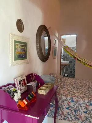 Uma cama ou camas num quarto em casa arandu