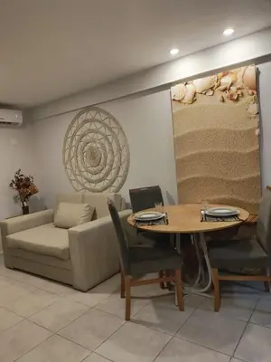 Uma área de estar em Flat Beira Mar Meireles