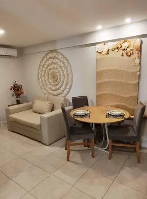 Uma área de estar em Flat Beira Mar Meireles