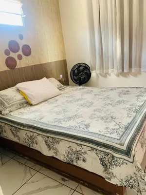 Uma cama ou camas num quarto em Ap beachfuturo420