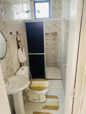 Uma casa de banho em Ap beachfuturo420