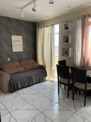 Uma área de estar em Ap beachfuturo420