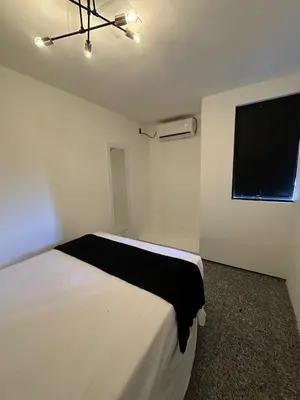 Uma cama ou camas num quarto em 205 Atlântico Residence Vista Mar