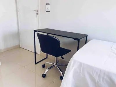 Uma cama ou camas num quarto em O Refúgio Perfeito para Sua Família!