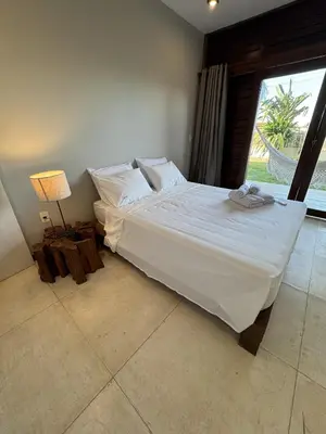 Uma cama ou camas num quarto em Apartamento Queen KiteVillage