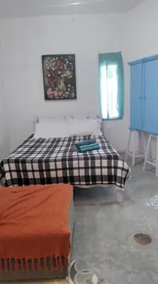 Uma cama ou camas num quarto em Casa Compartilhada - Shared house