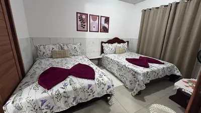 Uma cama ou camas num quarto em Casa da Ana Júlia