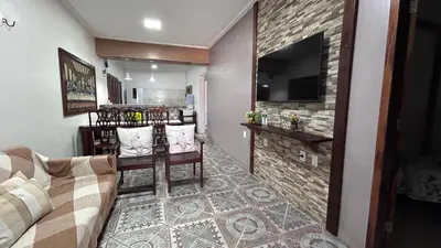 Uma televisão e/ou sistema de entretenimento em Casa da Ana Júlia