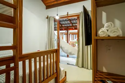 Uma cama ou camas num quarto em Villa do Ze