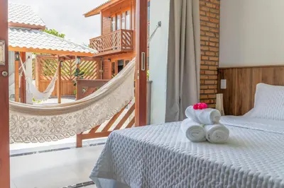 Uma cama ou camas num quarto em Villa do Ze