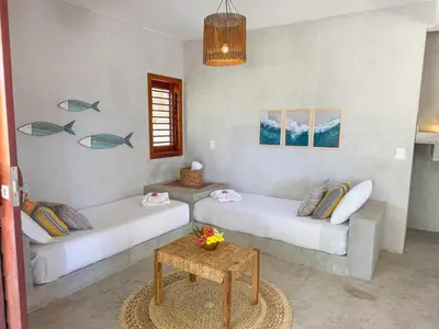 Uma área de estar em Casa Devagar Icaraizinho