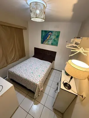 Uma cama ou camas num quarto em Apartamento mobiliado com dois quartos para locação fixo e mensal
