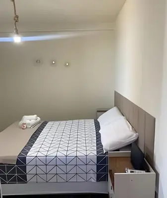 Uma cama ou camas num quarto em Atlântico Bela vista para o Mar