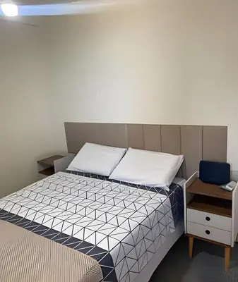 Uma cama ou camas num quarto em Atlântico Bela vista para o Mar