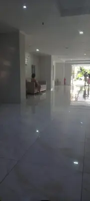 Uma área de estar em Beira-Mar Flat Venetto - Premium
