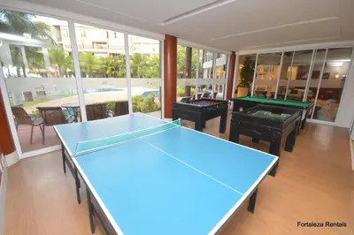 Comodidades para ténis de mesa em Beach Living Apartment ou nas proximidades