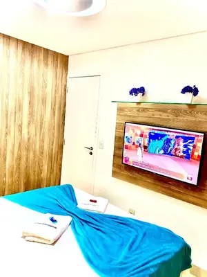 Uma televisão e/ou sistema de entretenimento em Landscape Beira Mar Vista Mar
