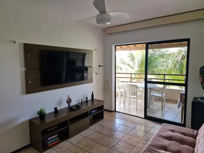 Uma televisão e/ou sistema de entretenimento em Aquaville Resort 3 suítes com ar condicionado Perto do Beach Park