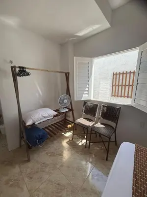 Uma cama ou camas num quarto em Refúgio da Major