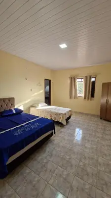 Uma cama ou camas num quarto em Casa de Temporada Sitio Tope