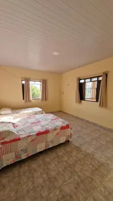 Uma cama ou camas num quarto em Casa de Temporada Sitio Tope
