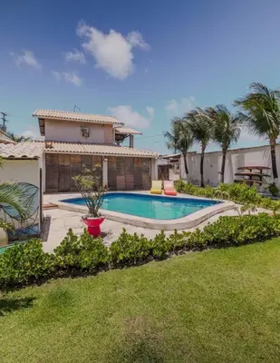 A piscina em ou perto de Lemos Surf House Piscina, Lazer e 100m da Praia