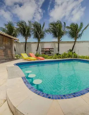 A piscina em ou perto de Lemos Surf House Piscina, Lazer e 100m da Praia