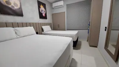 Uma cama ou camas num quarto em Apartamento em Porto das Dunas - Próximo ao Beach Park