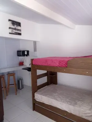Uma cama ou camas num quarto em suite completa na cobertura no prea ce