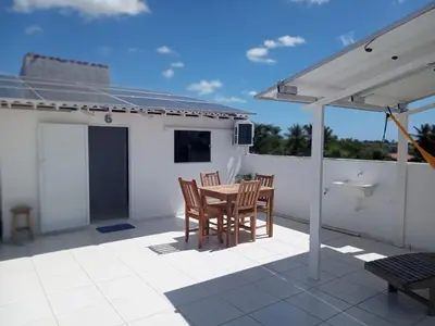 Uma varanda ou terraço em suite completa na cobertura no prea ce