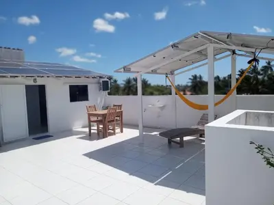 Uma varanda ou terraço em suite completa na cobertura no prea ce