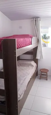 Uma cama ou camas num quarto em suite completa na cobertura no prea ce
