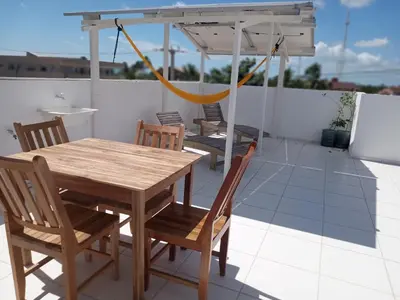 Uma varanda ou terraço em Cobertura solariun com 2 suites na praia do prea