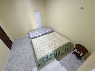 Uma cama ou camas num quarto em Apartamento em Mundaú