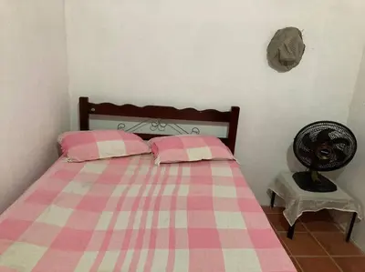 Uma cama ou camas num quarto em Casa Flor Morena
