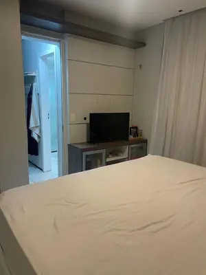 Uma televisão e/ou sistema de entretenimento em Casa Condomínio Eusébio Amador