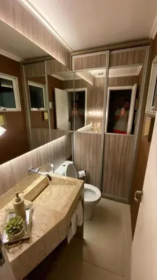 Uma área de estar em Casa Condomínio Eusébio Amador