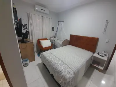 Uma cama ou camas num quarto em Casa de Praia na Prainha