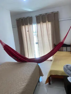 Uma cama ou camas num quarto em Apartamento Dunas
