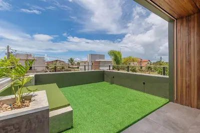 Uma varanda ou terraço em Summerville #117 - Luxo no Cumbuco by Carpediem