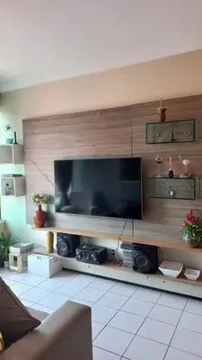 Uma televisão e/ou sistema de entretenimento em Apartamento em bairro nobre de Fortaleza