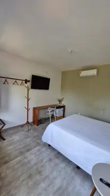 Uma cama ou camas num quarto em La Consta